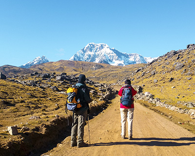 Men taking photo of Ausangate mountain