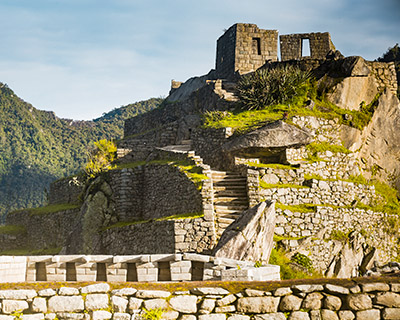Married couple enjoying the magnificent view of Machu Picchu
