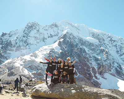 Cusco Expeditions group at the highest point of the journey with Salkantay in the background